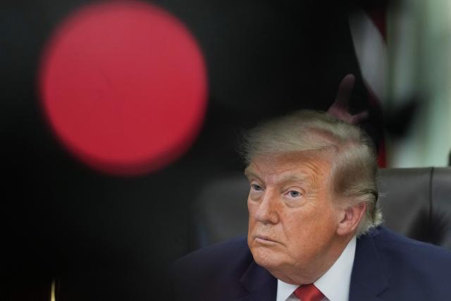 US President Donald Trump looks on during an announcement about Dulles International Airport renovations in the Oval Office of the White House in Washington, DC on July 29, 2026. (Photo by Ken Cedeno / AFP)