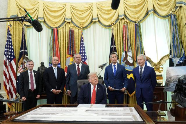 US President Donald Trump speaks during an announcement about Dulles International Airport renovations with Secretary of Transportation Sean Duffy (2R) in the Oval Office of the White House in Washington, DC on July 29, 2026. US President Donald Trump is set to unveil a $20 billion plan to rebuild and renovate Washington Dulles International Airport. (Photo by Ken Cedeno / AFP)