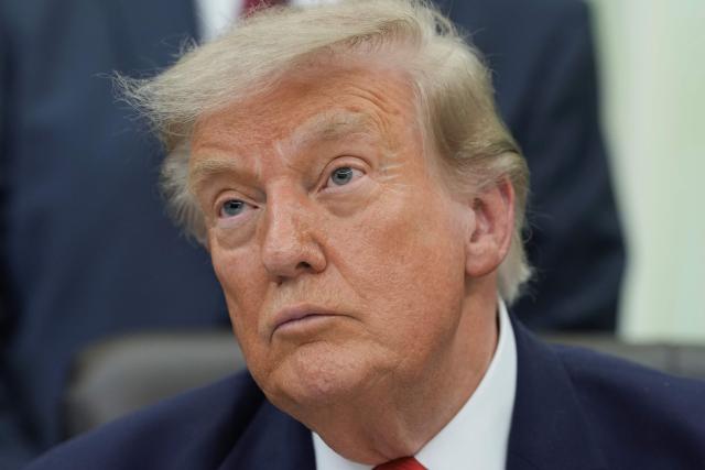 US President Donald Trump speaks in the Oval Office of the White House in Washington, DC, on July 29, 2026. US President Donald Trump unveiled on Wednesday a $20 billion plan to rebuild and renovate Washington Dulles International Airport. (Photo by Ken Cedeno / AFP)