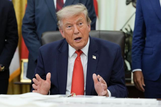 US President Donald Trump speaks during an announcement about Dulles International Airport renovations with Secretary of Transportation Sean Duffy in the Oval Office of the White House in Washington, DC on July 29, 2026. US President Donald Trump is set to unveil a $20 billion plan to rebuild and renovate Washington Dulles International Airport. (Photo by Ken Cedeno / AFP)