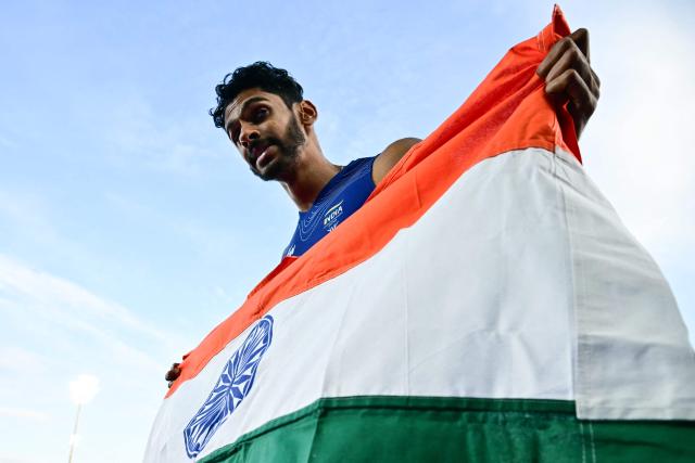 Second-placed India's Sreeshankar celebrates after competing in the men's long jump final during the athletics event at the Scotstoun Stadium in Glasgow, on day six of the Commonwealth Games in Glasgow, Scotland, on July 29, 2026. (Photo by Ben STANSALL / AFP)