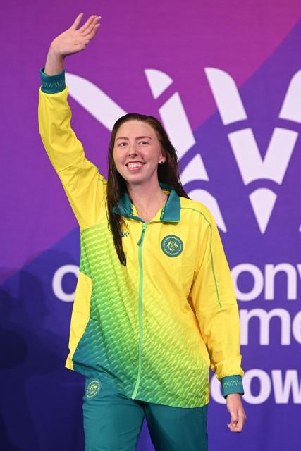 Gold medallist Australia's Lakeisha Patterson celebrates during the Women's S9 100m Freestyle Medal Ceremony at the swimming event at the Tollcross International Swimming Centre in Glasgow, on day six of the Commonwealth Games in Glasgow, Scotland, on July 29, 2026. (Photo by Oli SCARFF / AFP)