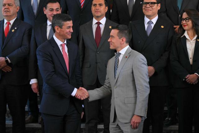 Paraguay's President Santiago Pena (L) shakes hands with Ecuador's President Daniel Noboa during a meeting at the Carondelet Palace in Quito on July 29, 2026. (Photo by Rodrigo BUENDIA / AFP)
