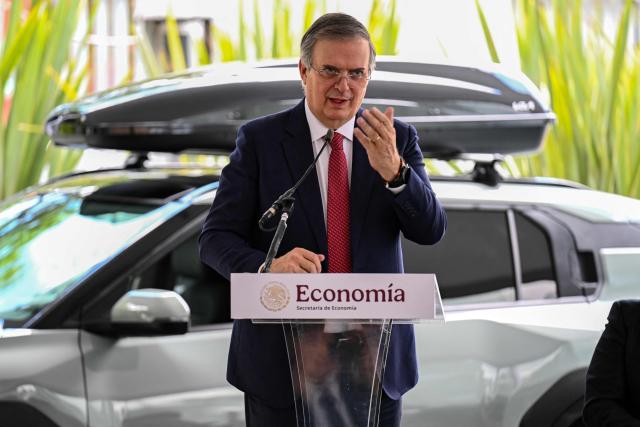 Mexican Economy Secretary Marcelo Ebrard speaks during the presentation of the Kia EV3 electric vehicle in Mexico City on July 29, 2026. Mexico announced on July 29 a multi-million-dollar investment by South Korean automaker Kia, amid tariff pressure maintained by the administration of US President Donald Trump on the sector and the threat of new levies. (Photo by Yuri CORTEZ / AFP)