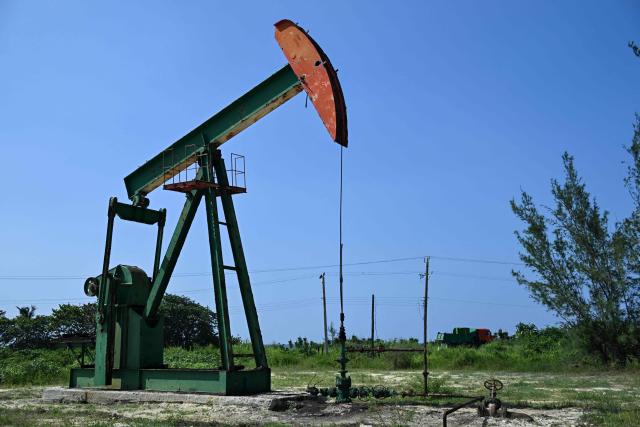 An old oil pump is pictured in Boca de Jaruco, Matabeque Province, Cuba on July 29, 2026. Cuba on July 29, 2026, moved to open several key crisis-ravaged sectors of its state-run economy to private firms, as the communist government tries to ease acute shortages resulting from a US energy blockade. (Photo by YAMIL LAGE / AFP)