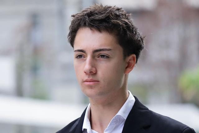 French teenager Didier Gaspard Owen Maximilien arrives at the State Courts in Singapore on July 30, 2026. A French teenager pleaded guilty to a public nuisance charge in Singapore on July 30, for a straw-licking stunt that landed him in hot water in the city-state. (Photo by Suhaimi Abdullah / AFP)