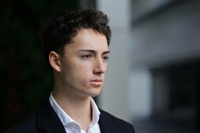 French teenager Didier Gaspard Owen Maximilien leaves the State Courts in Singapore on July 30, 2026. A French teenager pleaded guilty to a public nuisance charge in Singapore on July 30, for a straw-licking stunt that landed him in hot water in the city-state. (Photo by Suhaimi Abdullah / AFP)
