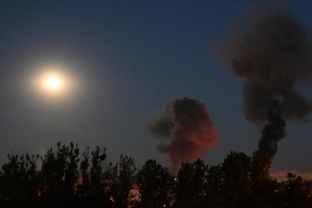 The photograph shows smoke in the sky following Russian missile strikes over the western Ukrainian city of Lviv on July 30, 2026, amid the Russian invasion in Ukraine. A Russian missile strike killed at least six people in central Ukraine, including two girls, the head of Kryvyi Rig's military administration said. (Photo by YURIY DYACHYSHYN / AFP)
