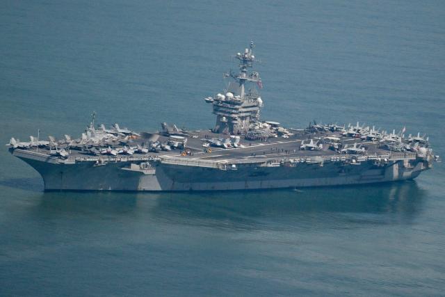 The USS George Washington arrives at the port in Danang on July 30, 2026. (Photo by Nhac NGUYEN / AFP)