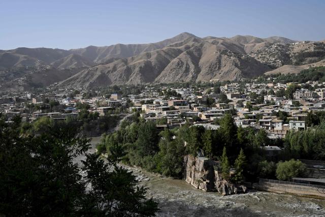 A general view shows the Kokcha River flowing through the Fayzabad district of Afghanistan's Badakhshan province on July 28, 2026. (Photo by Wakil KOHSAR / AFP)