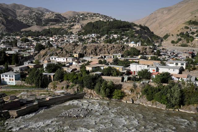 A general view shows the Kokcha River flowing through the Fayzabad district of Afghanistan's Badakhshan province on July 28, 2026. (Photo by Wakil KOHSAR / AFP)