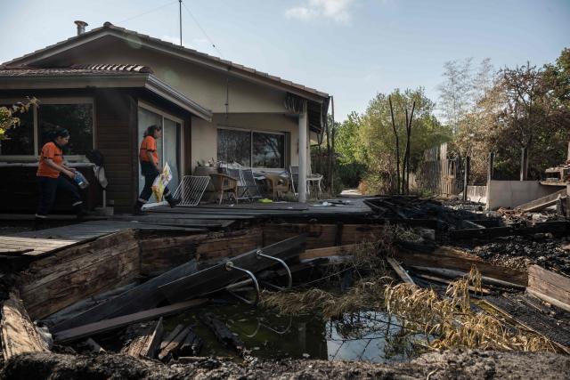 Members of the Lege-Cap-Ferret Reserve Communale Securite Civile check on neighborhood pets in Lege-Cap-Ferret, south-western France on July 30, 2026. (Photo by Ed JONES / AFP)