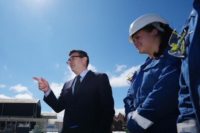 Britain's Prime Minister Andy Burnham reacts during a visit to BAE Systems, Submarine Academy for Skills and Knowledge (SASK), in Barrow in Furness, northern England on July 30, 2026 (Photo by Christopher Furlong / POOL / AFP)