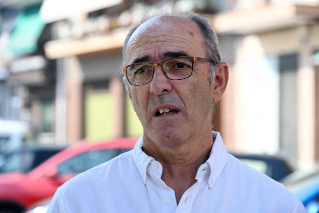 Arturo Varas, mayor of El Tiemblo, is pictured in the wake of wildfires that have ravaged the area, in El Tiemblo, 80 kilometres west of Madrid, on July 30, 2026. Spanish Prime Minister Pedro Sanchez today lifted the state of emergency over the wildfires in Madrid and Avila regions that forced the evacuations of tens of thousands of people. Wildfires have stopped spreading and there are "almost no flames", Spanish authorities said. But they warned that the ongoing heatwave threatens a resurgence of fire in areas west of Madrid, where more than 25,000 hectares (61,776 acres) have already gone up in smoke. (Photo by JAVIER SORIANO / AFP)