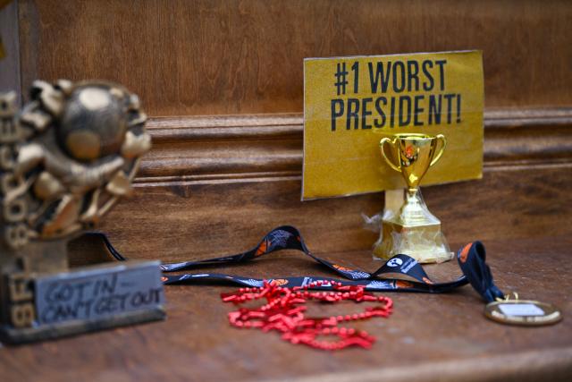 A satirical "Iran War Participation Trophy" is seen in Lower Manhattan in New York City on July 30, 2026. The satirical work is the latest installment by a group of anonymous artists that aim to mock US President Donald Trump. (Photo by Angela WEISS / AFP)