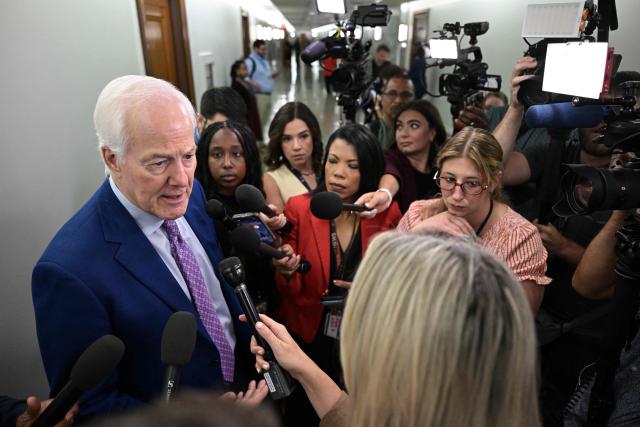 US Senator John Cornyn, Republican from Texas, speaks to reporters following a Senate Finance Committee hearing on Capitol Hill in Washington, DC, on July 30, 2026. According to US media reports, Republican Senators John Cornyn and Thom Tillis have said they still don't have everything they need from acting US Attorney General Todd Blanche in order to move forward in favor of his nomination. (Photo by Oliver Contreras / AFP)
