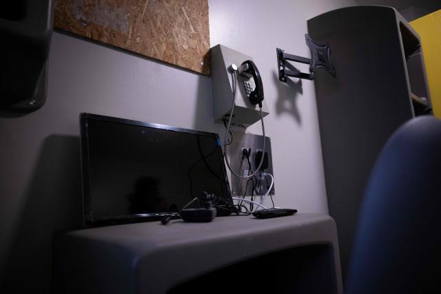 This photograph shows a telephone inside a cell at the third organised crime unit (drug-trafficking district), during a press tour at Reau Prison, near Paris on July 30, 2026. A third organised crime unit is set to open in France in the coming weeks, at Réau prison (Seine-et-Marne), one year after the first such unit opened in Pas-de-Calais, the prison service announced on July 30, 2026 during a press tour of the facility. (Photo by Lou BENOIST / AFP)