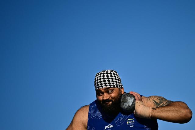 India's Tajinderpal Singh Toor competes in the men's shot put final during the athletics event at the Scotstoun Stadium in Glasgow, on day seven of the Commonwealth Games in Glasgow, Scotland, on July 30, 2026. (Photo by Ben STANSALL / AFP)