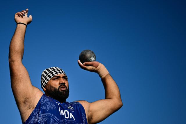 India's Tajinderpal Singh Toor competes in the men's shot put final during the athletics event at the Scotstoun Stadium in Glasgow, on day seven of the Commonwealth Games in Glasgow, Scotland, on July 30, 2026. (Photo by Ben STANSALL / AFP)