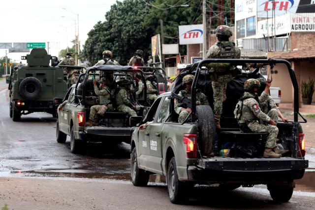 Mexican Army personnel secure the area where the Jalisco New Generation Cartel (CJNG) leader known as "R1" was captured in Atotonilco, Jalisco state, Mexico, on July 30, 2026. Mexico said on July 30 it had captured the alleged mastermind behind the assassination of a hardline anti-crime mayor last November, a killing that sparked international outrage. (Photo by ULISES RUIZ / AFP)