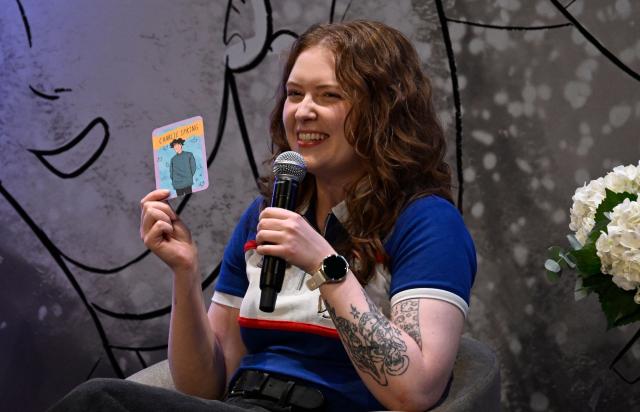 British author of Heartstopper Alice Oseman speaks during the presentation of the latest book in the Heartstopper saga at the Esperanza Iris Theater in Mexico City on July 30, 2026. The Heartstopper saga was adapted into a Netflix TV series and recently into a movie on the same platform. (Photo by Alfredo ESTRELLA / AFP)