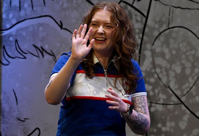 British author of Heartstopper Alice Oseman waves during the presentation of the latest book in the Heartstopper saga at the Esperanza Iris Theater in Mexico City on July 30, 2026. The Heartstopper saga was adapted into a Netflix TV series and recently into a movie on the same platform. (Photo by Alfredo ESTRELLA / AFP)