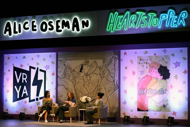 British author of "Heartstopper" Alice Oseman (C) speaks during her presentation of the latest book of the "Heartstopper saga" with Mexican Queer Literature Influencer Alejandra Solares (L) and the translator at the Esperanza Iris Theater in Mexico City on July 30, 2026. The Heartstopper saga was adapted into a Netflix TV series and recently into a movie on the same platform. (Photo by Alfredo ESTRELLA / AFP)