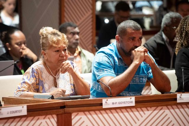 Marie-Pierre Goyetche (L) and Pascal Sawa, members of the Kanaky NC group at the Congress, attend a formal session to elect members of the Government of New Caledonia at the Congress in Noumea on July 31, 2026. (Photo by Delphine Mayeur / AFP)