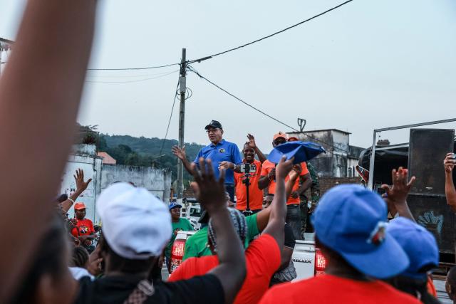 Carlos Vila Nova (C), President of the Democratic Republic of Sao Tome and Principe, address supporters, in Santo Antonio city, in Príncipe on July 30, 2026. (Photo by Daniel BELOUMOU OLOMO / AFP)