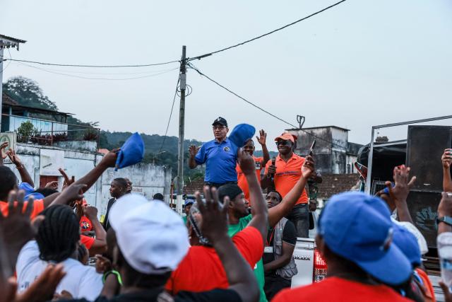 Carlos Vila Nova (C), President of the Democratic Republic of Sao Tome and Principe, address supporters, in Santo Antonio city, in Príncipe on July 30, 2026. (Photo by Daniel BELOUMOU OLOMO / AFP)