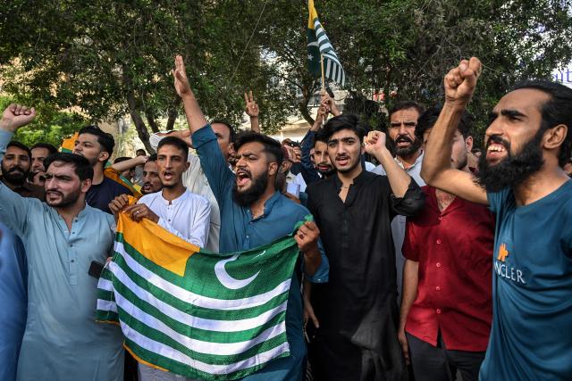 Kashmiri students shout slogans as they protest in Karachi on July 31, 2026 after unrest during the first phase of voting for the local legislature in Pakistan-administered Kashmir. Protesters and security personnel engaged in deadly clashes in Pakistan-administered Kashmir as the sensitive Himalayan region goes to the polls, an official said on July 28. (Photo by Rizwan TABASSUM / AFP)
