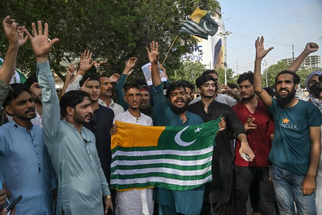 Kashmiri students shout slogans as they protest in Karachi on July 31, 2026 after unrest during the first phase of voting for the local legislature in Pakistan-administered Kashmir. Protesters and security personnel engaged in deadly clashes in Pakistan-administered Kashmir as the sensitive Himalayan region goes to the polls, an official said on July 28. (Photo by Rizwan TABASSUM / AFP)