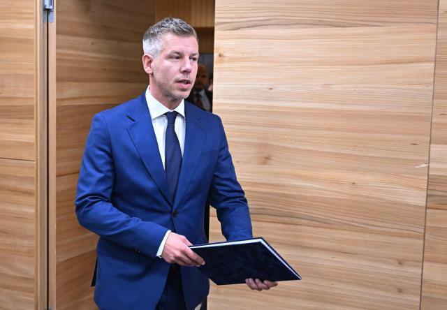 Hungary's Prime Minister Peter Magyar arrives for a press conference at the Paks nuclear power plant in Paks on July 31, 2026. Like many European rivers, the water level of the Danube is approaching its historic low. As a result, the power plant's cooling water system is also working under more difficult conditions due the critical hot weather and, according to the Prime Minister's announcement, the power plant's output will be further reduced in the evening hours. (Photo by Attila KISBENEDEK / AFP)