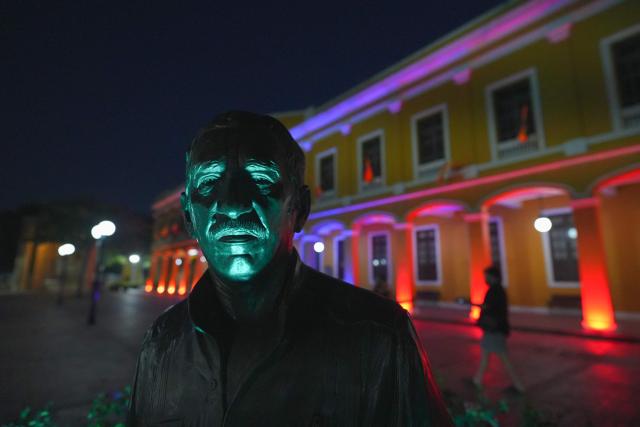 View of the statue of Colombia's late writer Gabriel Garcia Marquez (1937-2014), outside the historic Customs building, which was chosen by Colombia's President-elect, Abelardo de la Espriella, as one of the alternative locations from which he will conduct official business as head of state, in Barranquilla, Colombia, on July 30, 2026. De la Espriella will take office on August 7, 2026. (Photo by Vanexa Romero / AFP)