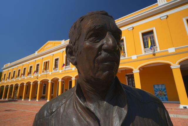 View of the statue of Colombia's late writer Gabriel Garcia Marquez (1937-2014), outside the historic Customs building, which was chosen by Colombia's President-elect, Abelardo de la Espriella, as one of the alternative locations from which he will conduct official business as head of state, in Barranquilla, Colombia, on July 30, 2026. De la Espriella will take office on August 7, 2026. (Photo by Vanexa Romero / AFP)