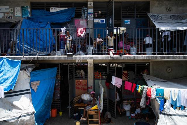Children are seen in a displacement camp in Port-au-Prince, Haiti, on July 31, 2026. Haiti's electoral council on July 27, 2026, set December 13 as the date for the crisis-wracked nation's first elections in a decade, pending the establishment of an "acceptable security environment." Elections have not been held in Haiti since 2016, and the country's last elected president, Jovenel Moise, was assassinated in 2021. (Photo by Clarens SIFFROY / AFP)