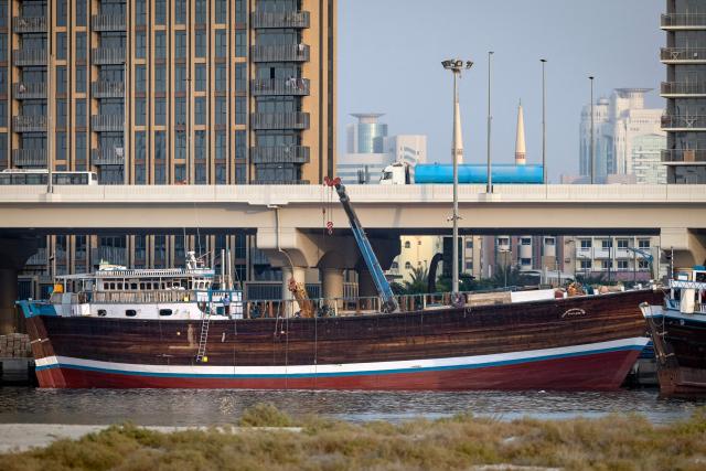 A vessel is anchored in the waters at Dubai on July 31, 2026. On February 28, Israel and the United States launched strikes on Iran killing its supreme leader and triggering a war that spread across the Middle East and unleashed chaos across global markets and sent oil prices soaring, throwing the region into chaos as Iran and the United States battle for control of the Strait of Hormuz water way. (Photo by FADEL SENNA / AFP) / 