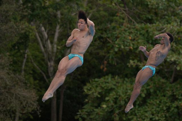Mexico’s Juan Celaya and Osmar Olvera take part in the  Men’s 3m Synchronised Springboard final during the XXV Central American and Caribbean Games in Santo Domingo on July 31, 2026. (Photo by Francesco SPOTORNO / AFP)