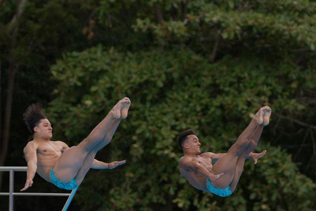 Mexico’s Juan Celaya and Osmar Olvera take part in the  Men’s 3m Synchronised Springboard final during the XXV Central American and Caribbean Games in Santo Domingo on July 31, 2026. (Photo by Francesco SPOTORNO / AFP)