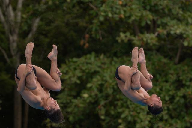 Venezuela's Jesus Gonzalez and Juan Travieso take part in the  Men’s 3m Synchronised Springboard final during the XXV Central American and Caribbean Games in Santo Domingo on July 31, 2026. (Photo by Francesco SPOTORNO / AFP)