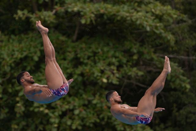 Dominican Republic’s Jose Calderon and Frandiel Gomez take part in the  Men’s 3m Synchronised Springboard final during the XXV Central American and Caribbean Games in Santo Domingo on July 31, 2026. (Photo by Francesco SPOTORNO / AFP)
