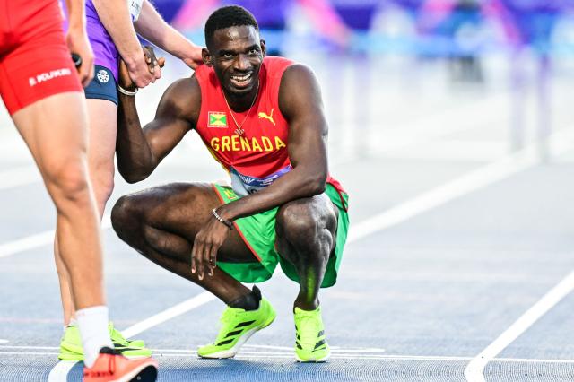Winner Grenada's Lindon Victor celebrates his victory in the overall decathlon competition after competing in the men's decathlon 1500m during the athletics event at the Scotstoun Stadium in Glasgow, on day eight of the Commonwealth Games in Glasgow, Scotland, on July 31, 2026. (Photo by ANDY BUCHANAN / AFP)