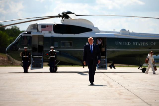 US President Donald Trump walks to board Air Force One before departing Hagerstown Regional Airport in Washington County, Maryland, on July 31, 2026, following a Cabinet meeting at Camp David. (Photo by Aaron Schwartz / AFP)