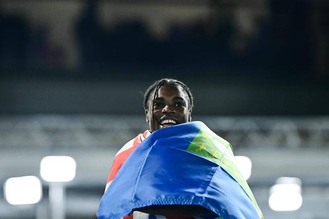 Winner British Virgin Islands' Adaejah Hodge celebrates after competing in the women's 200m final during the athletics event at the Scotstoun Stadium in Glasgow, on day eight of the Commonwealth Games in Glasgow, Scotland, on July 31, 2026. (Photo by Ben STANSALL / AFP)