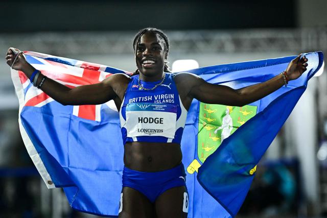 Winner British Virgin Islands' Adaejah Hodge celebrates after competing in the women's 200m final during the athletics event at the Scotstoun Stadium in Glasgow, on day eight of the Commonwealth Games in Glasgow, Scotland, on July 31, 2026. (Photo by Ben STANSALL / AFP)