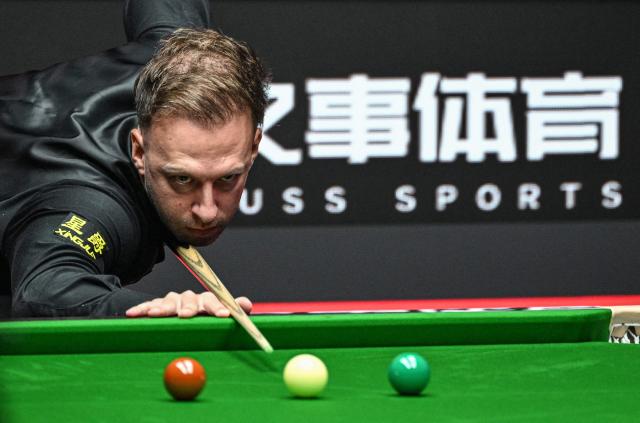 England's Judd Trump plays a shot during his match against England's Kyren Wilson at the Shanghai Masters snooker tournament in Shanghai on August 2, 2026. (Photo by Jade GAO / AFP)
