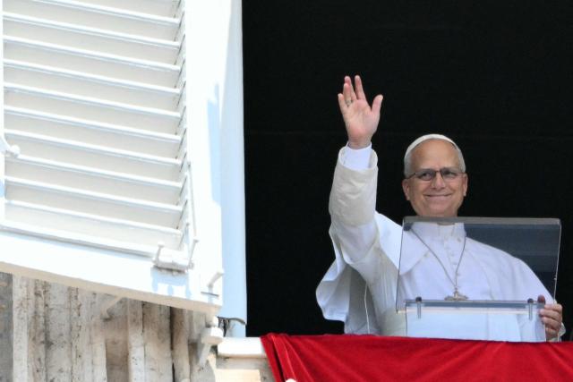 Pope Leo XIV addresses the crowd from the window of the apostolic palace overlooking St. Peter's square during the Angelus prayer in The Vatican on August 2, 2026. (Photo by Alberto PIZZOLI / AFP)