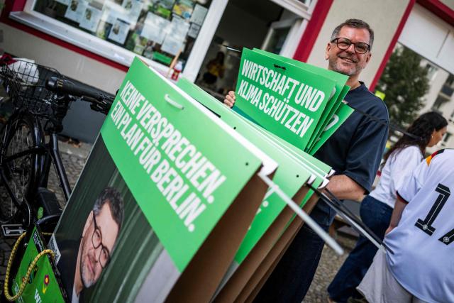 The Green Party's main candidate in upcoming regional elections in Berlin Werner Graf sorts campaign posters outside the Green Party's local headquarters in Berlin's district of Reinickendorf on August 2, 2026. Berlin goes to the polls on September 20, 2026. (Photo by John MACDOUGALL / AFP)