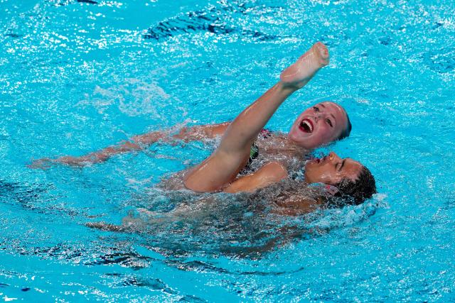 Bulgaria's artistic swimmers Dimitar Isaev and Magdalena Maleva compete in the mixed duet technical swimming final event during the LEN European Aquatics Championships, at the Olympic Aquatics Centre in Saint-Denis, northeastern suburbs of Paris, on August 2, 2026.  (Photo by Dimitar DILKOFF / AFP)