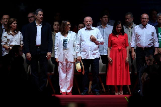 (L to R) Brazil's Secretary of Information and Digital Health Ana Estela Haddad, Brazil's Finance Minister Fernando Haddad, Brazil's First Lady Rosangela "Janja" Lula da Silva, Brazil's President Luiz Inacio Lula da Silva, Brazil's second lady Maria Lucia "Lu" Alckmin and Brazil's Vice-President Geraldo Alckmin attend the Workers' Party (PT) national convention in Sao Paulo, Brazil, on August 2, 2026, where Lula formally announces his bid for re-election. At 80, President Lula on July 2 launches his bid for re-election, casting himself as a defender of Brazil's "sovereignty" as pressure from President Donald Trump's administration casts a shadow over the campaign. (Photo by Miguel SCHINCARIOL / AFP)